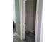 A walk-in closet with modern grey wood floors and shelving at 8125 Rio De Janeiro Dr, Las Vegas, NV 89128