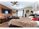This bedroom is a cozy space with a built in shelf behind the headboard of the bed at 9293 Boltonia Ct, Las Vegas, NV 89149