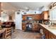 Bright kitchen features stainless appliances, modern backsplash and access to the living room at 9293 Boltonia Ct, Las Vegas, NV 89149