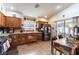 Well-lit kitchen with stainless steel appliances and ample counter space at 9293 Boltonia Ct, Las Vegas, NV 89149
