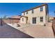 Large, private backyard featuring gravel landscaping and a sliding glass door for easy indoor-outdoor living at 933 Monte Nerone Ave, Henderson, NV 89012