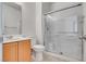 Clean bathroom with glass-enclosed shower, vanity, and updated fixtures at 933 Monte Nerone Ave, Henderson, NV 89012