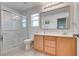 Bathroom featuring a glass shower, tile flooring, and a wooden vanity at 933 Monte Nerone Ave, Henderson, NV 89012