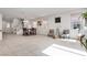 Open concept living area featuring tile floors, neutral paint, and natural light at 933 Monte Nerone Ave, Henderson, NV 89012