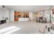 Open concept living space featuring tile floors and updated kitchen at 933 Monte Nerone Ave, Henderson, NV 89012