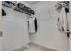 Walk-in closet with wire shelving, clothing rack, and ample storage space at 933 Monte Nerone Ave, Henderson, NV 89012