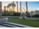 Backyard featuring water feature, palm trees, and the High Roller at 1 Hughes Center Dr # 308, Las Vegas, NV 89169