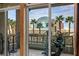 Balcony featuring workout equipment and bistro table, with panoramic views of city landmarks at 1 Hughes Center Dr # 308, Las Vegas, NV 89169