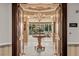 Grand entryway showcasing a chandelier and an elegant table at 1 Hughes Center Dr # 308, Las Vegas, NV 89169