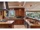 Gourmet kitchen features granite counters, breakfast bar, and a built-in beverage center at 1 Hughes Center Dr # 308, Las Vegas, NV 89169