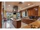 Modern kitchen with granite countertops, stainless steel appliances, and ample natural light at 1 Hughes Center Dr # 308, Las Vegas, NV 89169