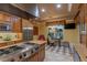 Gourmet kitchen with stainless steel appliances, granite countertops, custom cabinets, and a large center island at 1 Hughes Center Dr # 308, Las Vegas, NV 89169