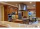 Spacious kitchen boasts an oversized island, professional-grade appliances, and custom cabinetry for ample storage at 1 Hughes Center Dr # 308, Las Vegas, NV 89169