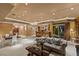Expansive open-concept living room with a dining area and comfortable seating at 1 Hughes Center Dr # 308, Las Vegas, NV 89169