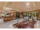 Spacious living area with dining space, bar, and comfortable seating at 1 Hughes Center Dr # 308, Las Vegas, NV 89169