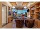 Opulent office with custom cabinetry, a marble desk, and stunning city views at 1 Hughes Center Dr # 308, Las Vegas, NV 89169
