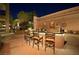 An outdoor bar features ample seating and is the perfect spot for entertaining guests at 1 Hughes Center Dr # 308, Las Vegas, NV 89169