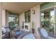 Cozy patio furnished with comfortable seating, and electric fireplace, perfect for relaxing at 1 Hughes Center Dr # 308, Las Vegas, NV 89169