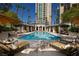 Luxurious swimming pool surrounded by lounge chairs and cabanas for ultimate relaxation at 1 Hughes Center Dr # 308, Las Vegas, NV 89169