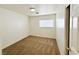 This bedroom has a window, carpet, and a built-in shelf at 11036 Parete Ct, Las Vegas, NV 89141