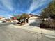 Charming single-story home with a well-maintained front yard and a two-car garage on a corner lot at 11036 Parete Ct, Las Vegas, NV 89141