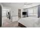 Main bedroom with ensuite bathroom and closet in view; neutral walls and bright lighting at 121 Manzanita Falls Ave, North Las Vegas, NV 89031