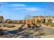 Community playground featuring slides and play equipment for enjoyment at 121 Manzanita Falls Ave, North Las Vegas, NV 89031