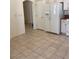 Spacious kitchen with white appliances, countertops, and tile flooring at 1742 Franklin Chase Ter, Henderson, NV 89012