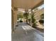 Charming covered patio with a pergola, neutral colors, and views of manicured landscaping at 1742 Franklin Chase Ter, Henderson, NV 89012