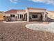 Spacious backyard with covered patio, perfect for outdoor entertaining at 2456 Palmridge Dr, Las Vegas, NV 89134