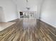Open living room features vaulted ceilings, lots of natural light and beautiful floors throughout at 2456 Palmridge Dr, Las Vegas, NV 89134