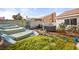 Expansive backyard featuring a pool, hot tub, and unique water feature at 266 Corvallis Ct, Henderson, NV 89074