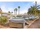 Backyard with pool, hot tub, and tranquil water feature, surrounded by palm trees at 266 Corvallis Ct, Henderson, NV 89074