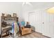 Bedroom featuring a desk, chair and double-door closet for convenient storage at 266 Corvallis Ct, Henderson, NV 89074