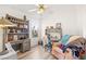 Cozy bedroom with ample natural light, featuring a desk and comfortable seating at 266 Corvallis Ct, Henderson, NV 89074