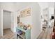 Inviting hallway adorned with Gathering photos, leading to various living spaces at 266 Corvallis Ct, Henderson, NV 89074