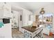 Charming kitchen island with butcher block countertop and white cabinets offering storage at 266 Corvallis Ct, Henderson, NV 89074