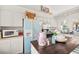 Bright kitchen featuring white cabinets and a charming vintage fridge at 266 Corvallis Ct, Henderson, NV 89074