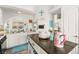 Well-lit kitchen featuring white cabinetry and a center island at 266 Corvallis Ct, Henderson, NV 89074