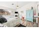 Bright main bedroom featuring a ceiling fan, fireplace, and a spacious layout at 266 Corvallis Ct, Henderson, NV 89074