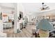 Bright open floorplan offering a fireplace, dining nook, and view to the backyard pool at 266 Corvallis Ct, Henderson, NV 89074