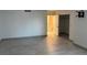 Bedroom view featuring wood-look floors, neutral color scheme, and closet access at 2692 Matogroso Ln, Las Vegas, NV 89121