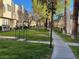 A nice exterior view of the building's lawn and the walking paths that go in between the residences at 2692 Matogroso Ln, Las Vegas, NV 89121