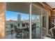 Relax on this inviting balcony with city views, featuring a dining table perfect for outdoor meals at 2747 Paradise Rd # 404, Las Vegas, NV 89109