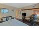 Comfortable room boasts dark wood floors, modern accents, and natural light at 2747 Paradise Rd # 404, Las Vegas, NV 89109