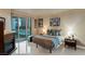 Bright, airy bedroom with fireplace, city view, and stylish decor at 2747 Paradise Rd # 404, Las Vegas, NV 89109