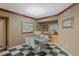 Dining area showcases modern decor with an elegant marble table and checkered floors at 2747 Paradise Rd # 404, Las Vegas, NV 89109