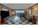 Spacious living room featuring a TV, sleek marble floors, and comfortable seating at 2747 Paradise Rd # 404, Las Vegas, NV 89109