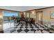 Spacious living room featuring a balcony, sleek marble floors, and comfortable seating at 2747 Paradise Rd # 404, Las Vegas, NV 89109