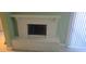 Painted brick fireplace with a mantel in the living room at 2981 Country Manor Ln # 2, Las Vegas, NV 89115